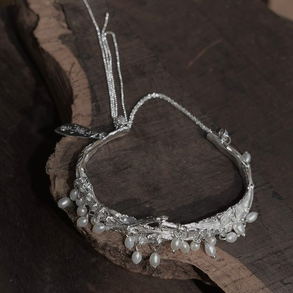 Ογκομετρικό γυναικείο βραχιόλι με πέρλες