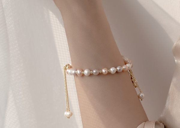 Naiste pärlitega käevõru ja dekoratiivkividega lilleline ripats