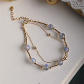 Moodne naiste kuukivi ja ripatsiga käevõru