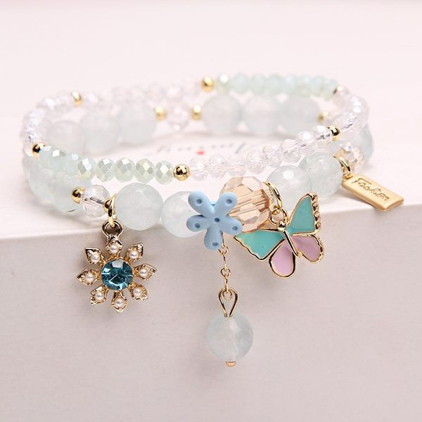 Naiste ripatsite ja helmestega käevõru