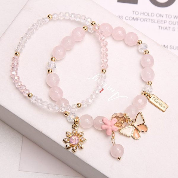 Naiste ripatsite ja helmestega käevõru