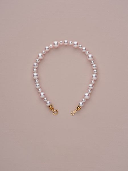 Λεπτό γυναικείο βραχιόλι με πέρλες