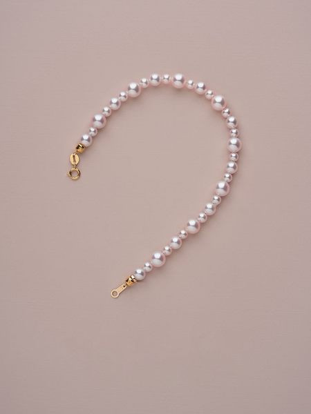 Λεπτό γυναικείο βραχιόλι με πέρλες