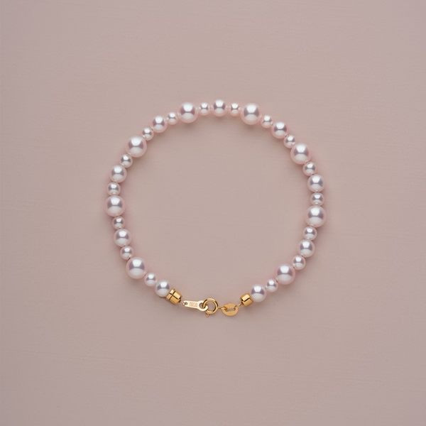 Λεπτό γυναικείο βραχιόλι με πέρλες