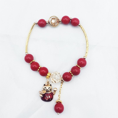 Νέο μοντέλο γυναικείο βραχιόλι με κόκκινες πέτρες και μενταγιόν