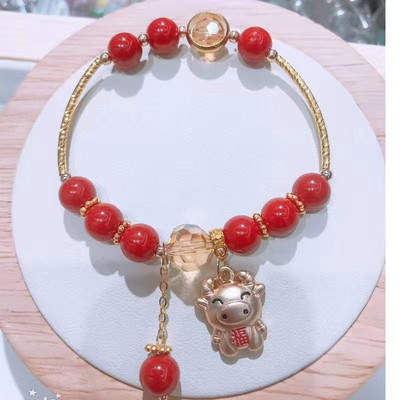 Νέο μοντέλο γυναικείο βραχιόλι με κόκκινες πέτρες και μενταγιόν