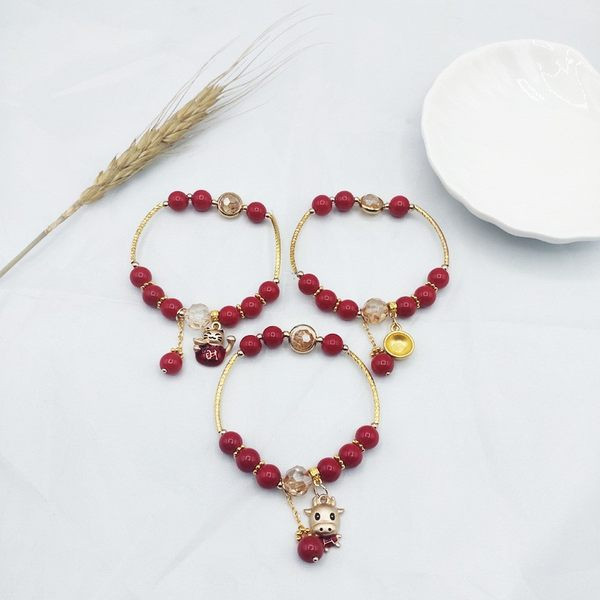 Νέο μοντέλο γυναικείο βραχιόλι με κόκκινες πέτρες και μενταγιόν