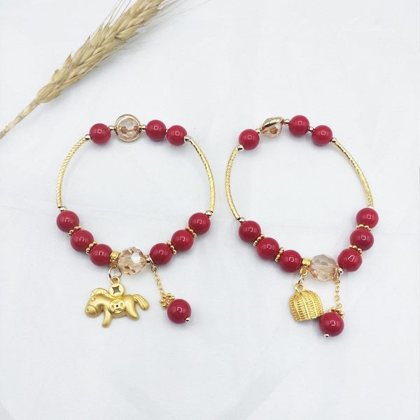 Νέο μοντέλο γυναικείο βραχιόλι με κόκκινες πέτρες και μενταγιόν