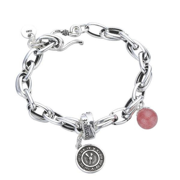 Dvostruka narukvica s velikom pletenicom i privjescima