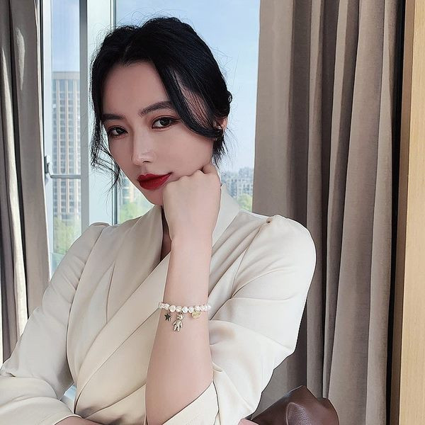 Naiste pärlitest käevõru karu ripatsi ja dekoratiivkividega