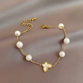 Μοντέρνο γυναικείο βραχιόλι διακοσμημένο με πέρλες και πεταλούδες