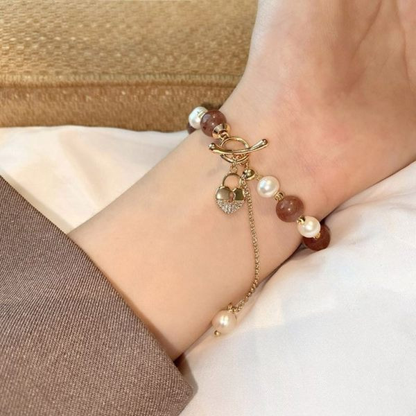 Γυναικείο βραχιόλι με πέρλες και μενταγιόν καρδιά