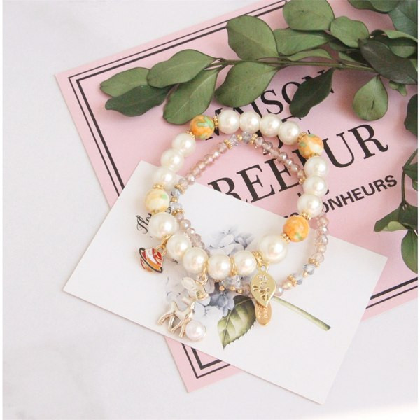 Γυναικεία μενταγιόν με πέρλες