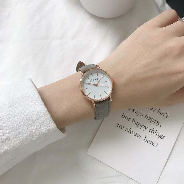 Γυναικείο ρολόι με στρογγυλό σχήμα και δερμάτινο λουράκι