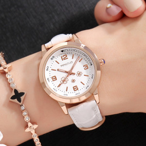 Naiste helendav käekell kunstnahast rihmaga