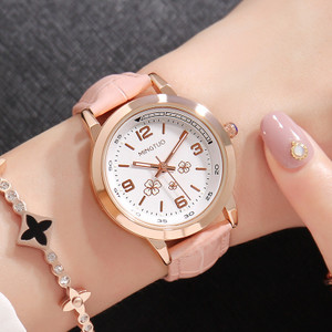 Naiste helendav käekell kunstnahast rihmaga