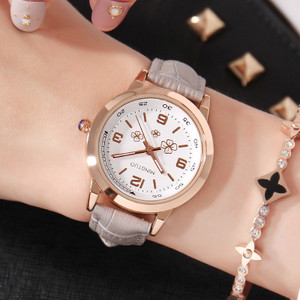 Naiste helendav käekell kunstnahast rihmaga