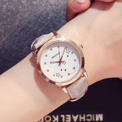 Naiste helendav käekell kunstnahast rihmaga