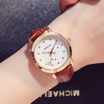 Naiste helendav käekell kunstnahast rihmaga