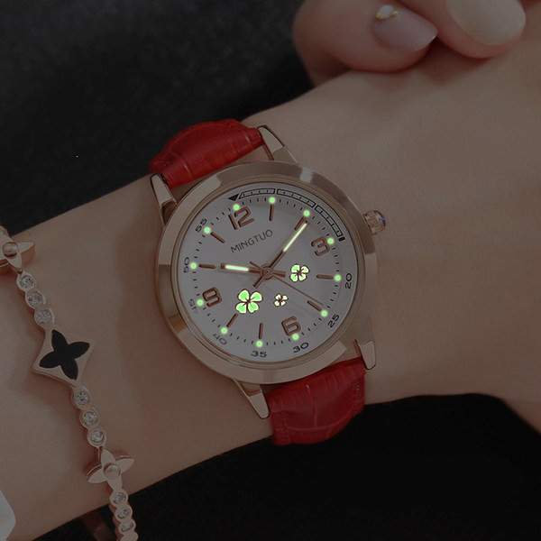 Naiste helendav käekell kunstnahast rihmaga