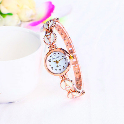 Γυναικείο ρολόι με στρογγυλό σχήμα - χρυσό χρώμα