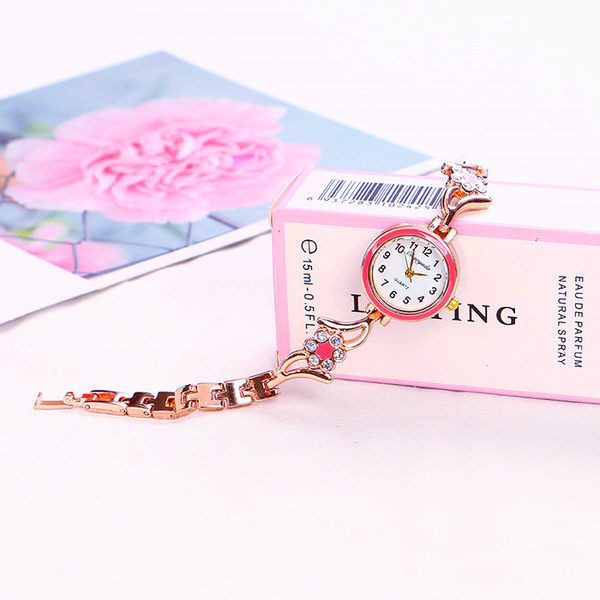 Mali ženski sat sa ukrasnim kamenčićima