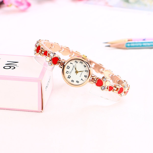 Moderan ženski zlatni sat sa kamenčićima za žene