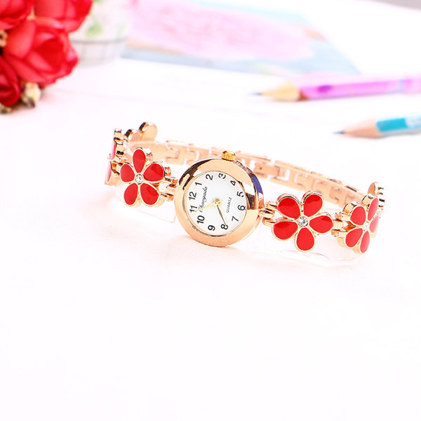 Aktualni okrugli sat s cvijećem