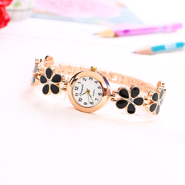 Aktualni okrugli sat s cvijećem