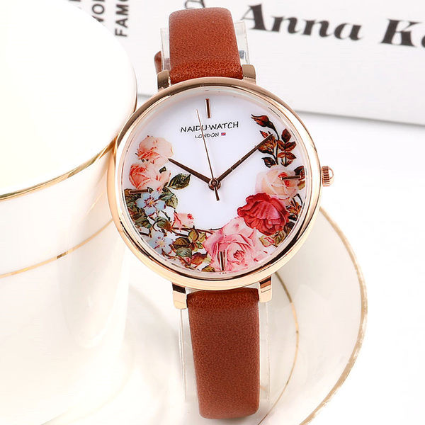 Naiste veekindel lilledega käekell