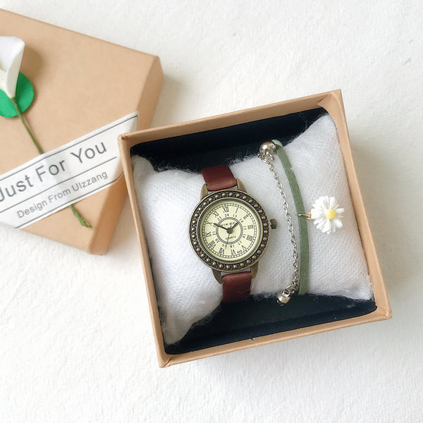 Okrugli sat s kožnim remenom - za žene