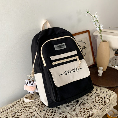 Suur tekstiilist seljakott võtmehoidjaga