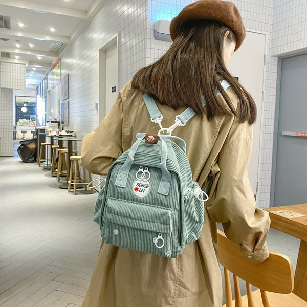 Γυναικείο υφασμάτινο σακίδιο πλάτης με κεντητή επιγραφή