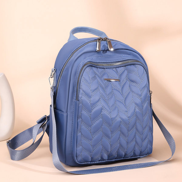 Ženski platneni ruksak s nekoliko pretinaca