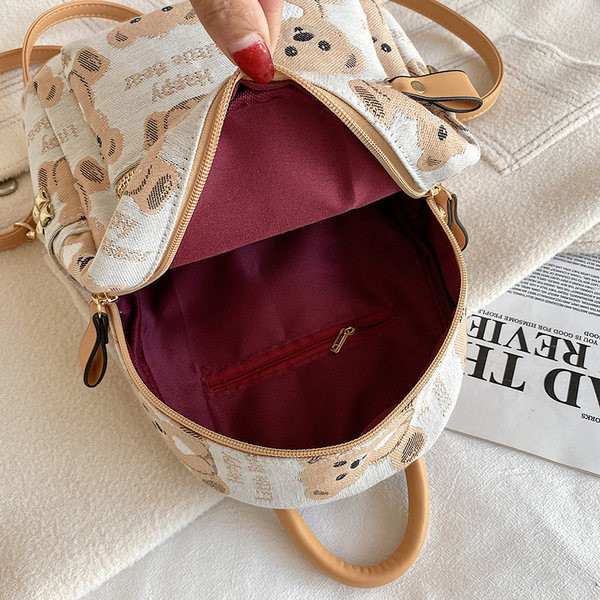 Ženski šareni ruksak sa životinjskim printom i patentnim zatvaračima