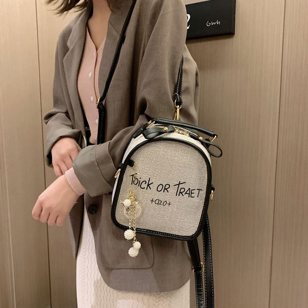 Ženski mali tekstilni ruksak sa natpisom i 3D dekoracijom