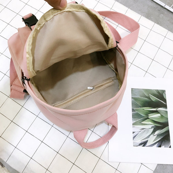 Uue mudeli tekstiilist naiste seljakott esitaskuga