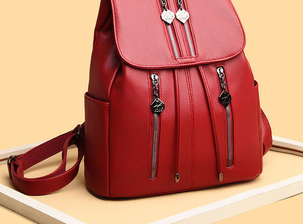 Naiste kunstnahast lipsude ja lukuga seljakott