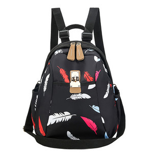 Värviline lillemotiividega naiste seljakott