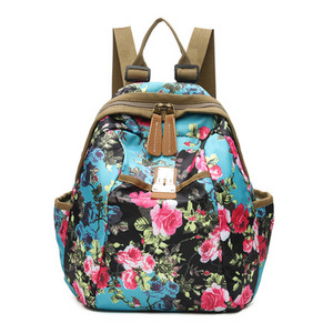 Värviline lillemotiividega naiste seljakott