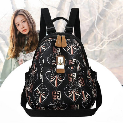 Värviline lillemotiividega naiste seljakott