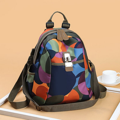 Värviline lillemotiividega naiste seljakott