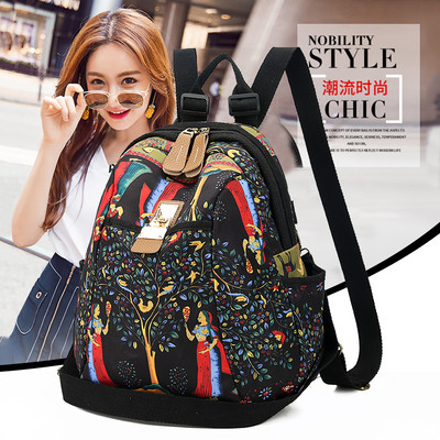 Värviline lillemotiividega naiste seljakott