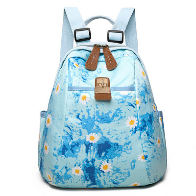 Värviline lillemotiividega naiste seljakott