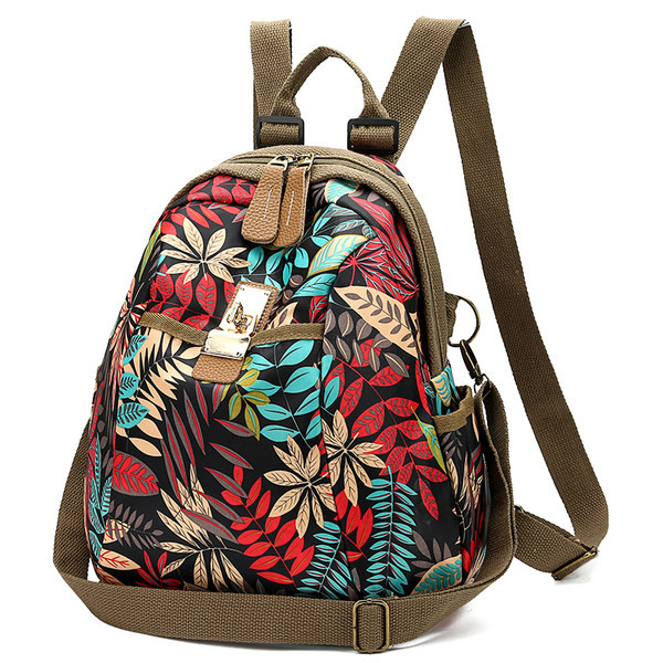 Värviline lillemotiividega naiste seljakott