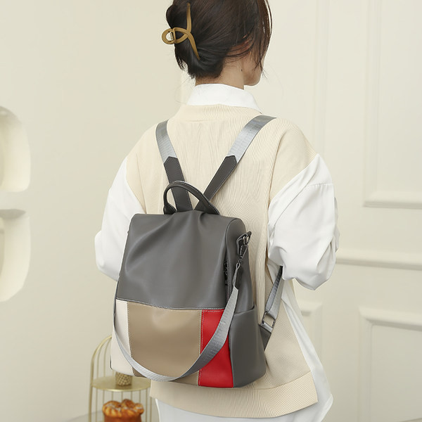 Šareni ženski ruksak od eko kože sa dvije ručke