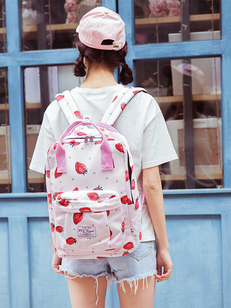 Naiste tekstiilist seljakott trükise ja embleemiga