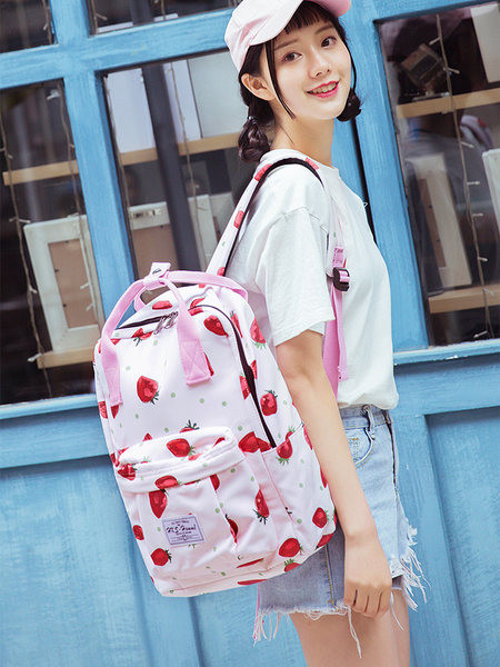 Naiste tekstiilist seljakott trükise ja embleemiga