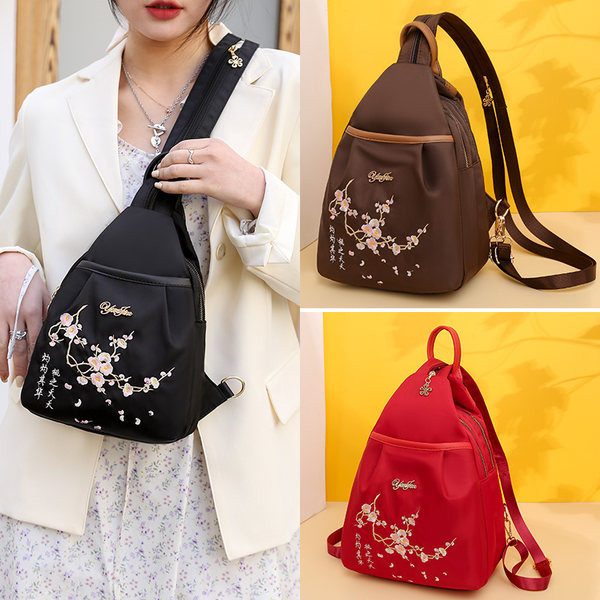 Ženski tekstilni ruksak s vezom