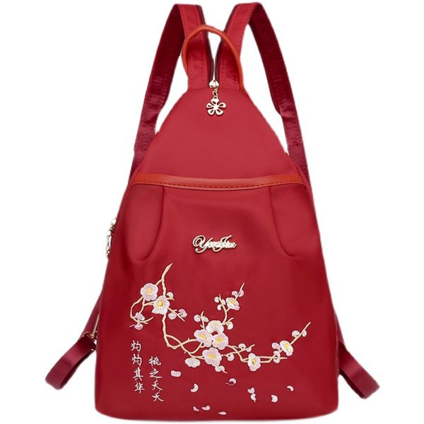 Ženski tekstilni ruksak s vezom